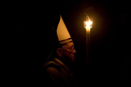 Pope Francis processes into St Peter's Basilica this evening (AP)
