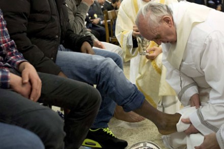 Pope Francis washes the foot of a prisoner at Casal del Marmo youth prison in Rome (Photo: CNS)