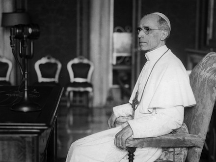 Pius XII prepares to give a radio address in 1943 (CNS)