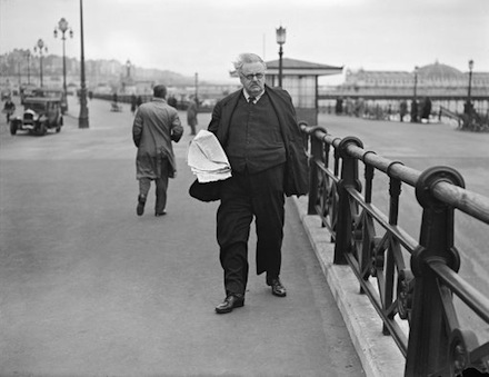 G.K. Chesterton, critic, novelist and poet, takes a stroll in Brighton (AP Photo)
