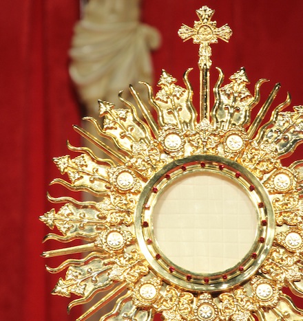 A monstrance holding the Blessed Sacrament is displayed (PA)