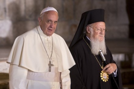 Pope Francis stands with Ecumenical Patriarch Bartholomew I as they meet outside the Church of the Holy Sepulchre (CNS)