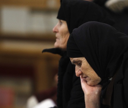 Albanian Catholic women at prayer in northern Albania. The Pope visits the country in September (CNS)