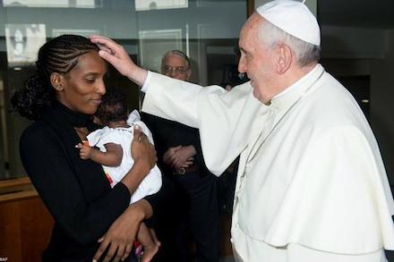 Pope Francis blesses Meriam Ibrahim yesterday (via @bettapique)