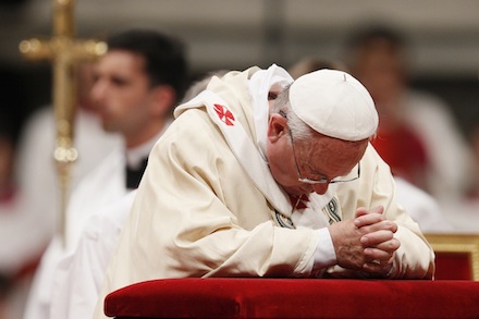 Pope Francis prays during the ordination of two bishops last year (Photo: CNS)